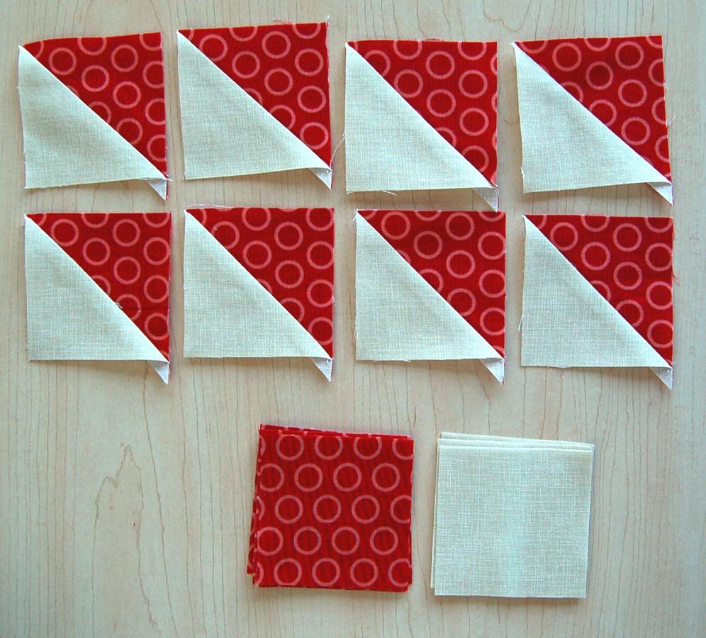 Press your Half square triangles open with the seams going towards the darker side. You should have 8.