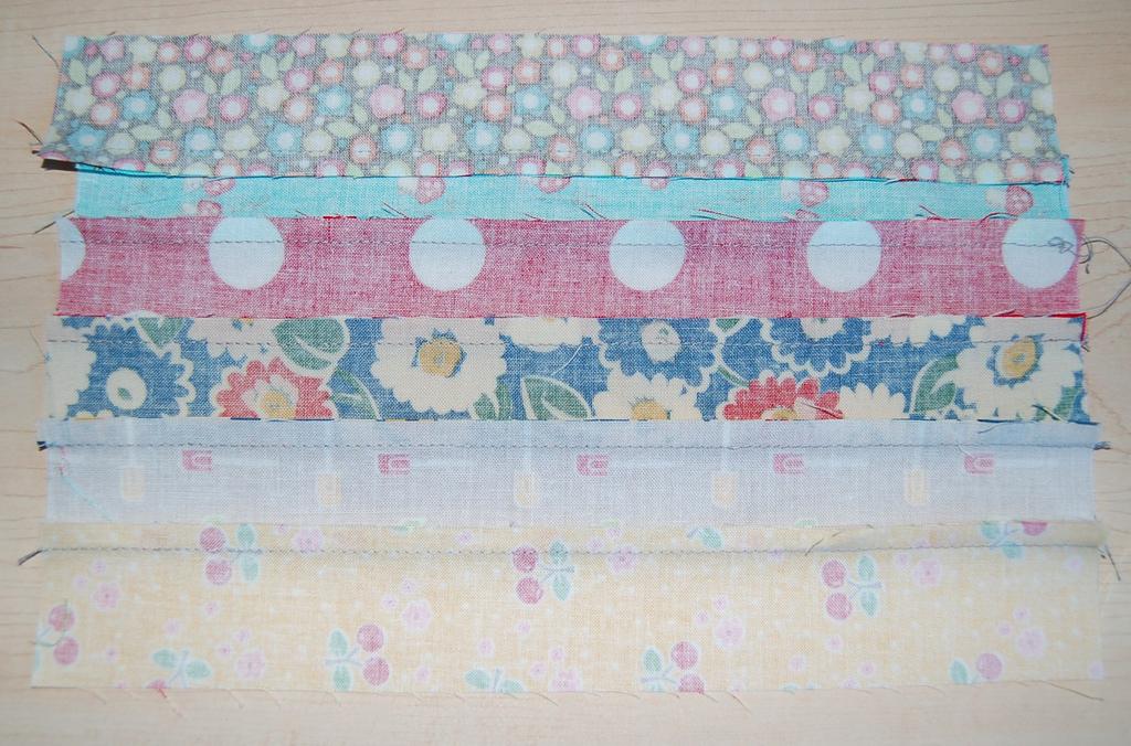 You will now sew 3 pairs together into a block of 6 strips. You will want all of the seams in these blocks to be pressed in the same direction.