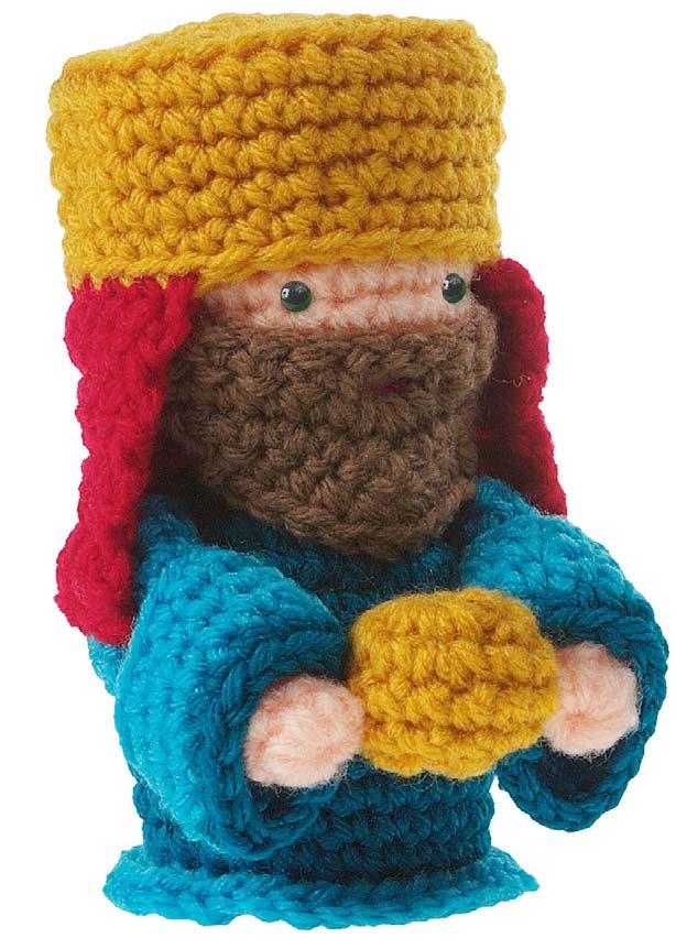 First Wise Man (with gold and red hat) About 5 1 2" tall Worsted-weight Worsted-weight yarn: small amounts yarn: small skin amounts skin color, turquoise, color, teal, turquoise, gold, red, teal,