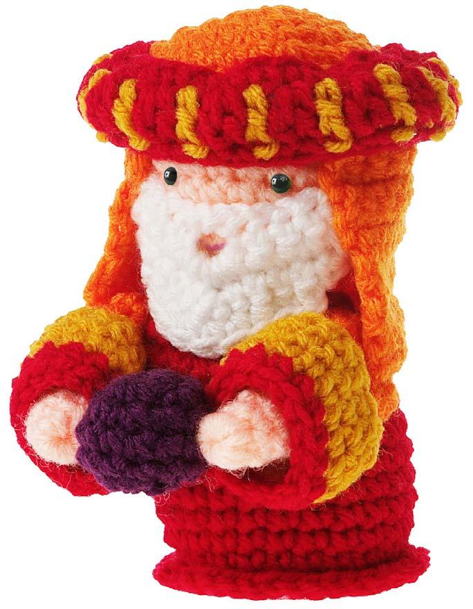 Third Wise Man (with orange and red hat) About 5 1 2" tall Worsted-weight Worsted-weight yarn: small amounts yarn: small skin amounts color, skin color, red, gold, orange, red, purple, gold, orange,