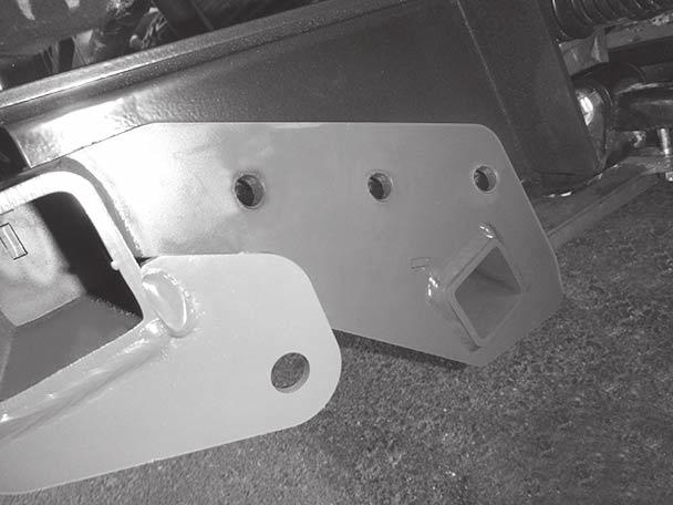 11. Install the mount assembly onto the skid plate assembly by lining up the four holes of the mount assembly connector plates with the four front holes of the skid plate assembly arms.