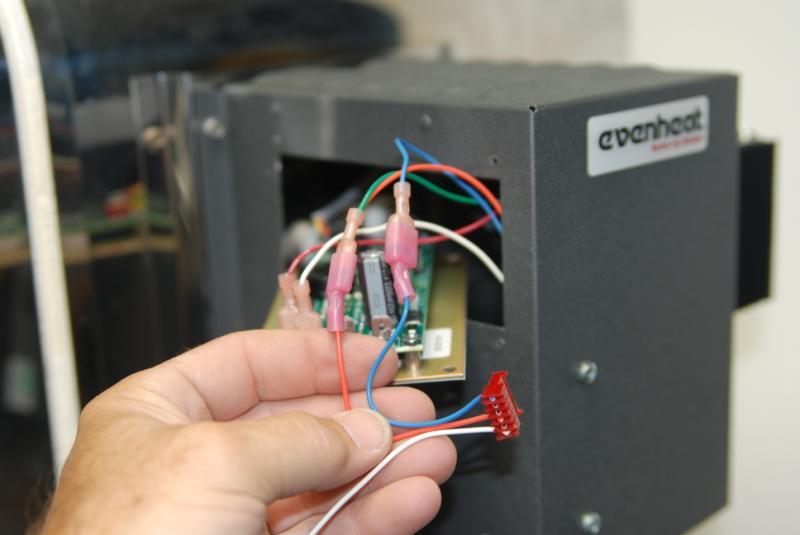 Step 5: Pull the wire from the control that is located to the right of