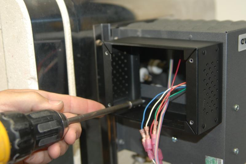 Step 15: Secure the TAP enclosure to your existing kiln control panel with the included