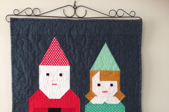 NORM AND NANETTE WITH MARYANNE: Gnome siblings, suspiciously looking like Santa and Mrs.