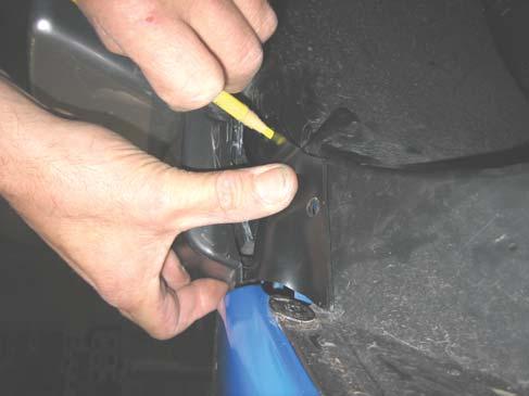 Front Flare Installation Procedures: 11 12 Holding Front Inner Peice on front of wheel well, next to