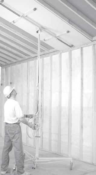 Load the PANELLIFT Drywall Lift from the front as shown with the face paper of the drywall contacting the cradle.