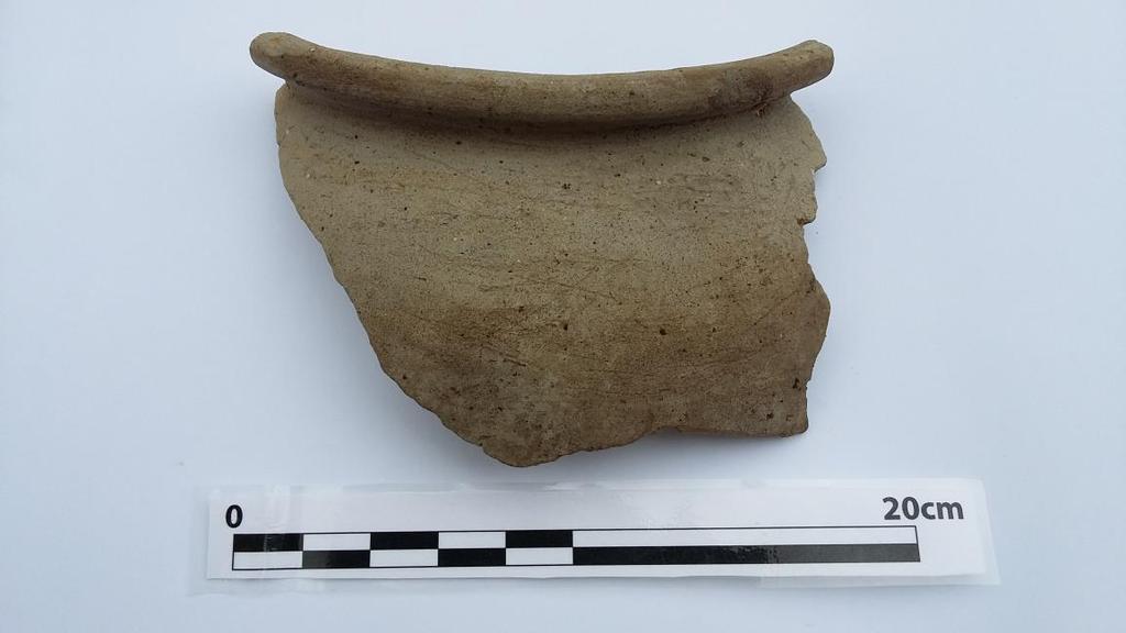 Figure 3. Part of a jar found in Trench 2 with faint scratch marks (Photograph: Author).