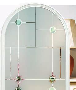 featuring coloured glass, a stippled effect backing glass and patina zinc