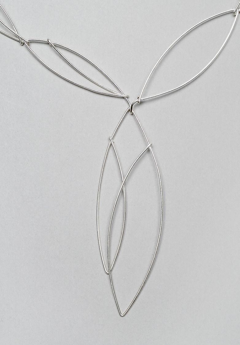 (on t make a second clasp hook.) ecause of the longer initial measurement, this leaf will have an elongated point. ttach the clasp-hook form to the right-hand end of the necklace.