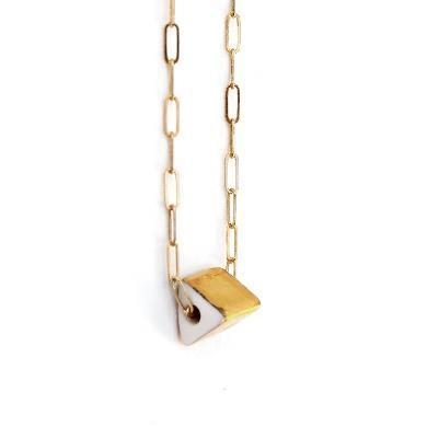 available on a 22 chain for $39 Prism Necklace