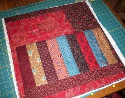 Set aside. Using the coordinating fabric, cut two squares that are 21" x 21". (This was a good measurement for my chair.