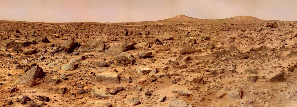 Credit: NASA Mars is a dry, desolate place without flowing water or vegetation. The surface is covered by fine, dusty sand, similar to a desert on Earth.