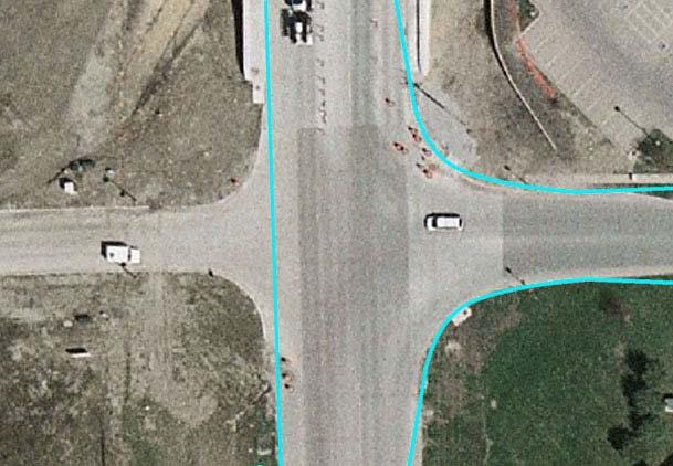 Figure 2: Uncontrolled intersection with turn lane, virtual (blue) overlaid on real world. The final intersection analyzed, a T-intersection, is shown in Figure 3.
