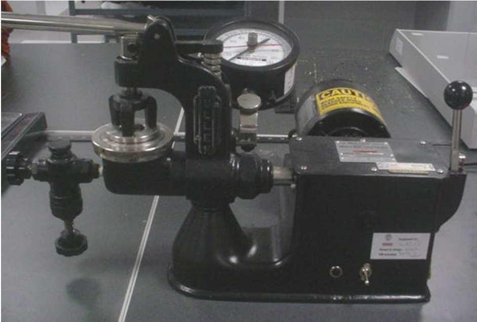 Apparatus and Material Inflatable diaphragm bursting tester consisting of clamps to firmly hold the specimen; natural or synthetic rubber diaphragms; Bourdon type pressure gage with accuracy