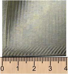Figure-1. Specific defects on the surface of turbine blade made of heat-resistant alloy after the milling: waviness (a) and surface layer damages in the form of notches (b).