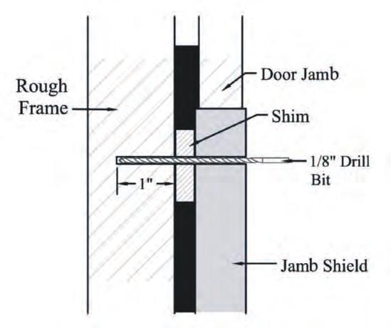 drill bit, pre-drill the holes for the Jamb Shield as laid out on the diagram in (FIG. JS-05). Be sure to drill through the finished frame, the Jamb Shield, the door shims and at least in.