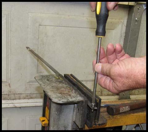Once the hole is tapped, run a test screw in the newly threaded hole.