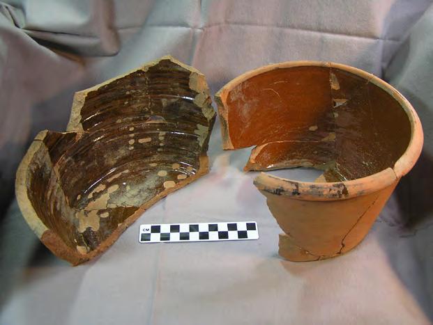 Thwings Point 2015 15 Figure 19. Two partially reconstructed redware vessels from Feature 6 cellar hole.