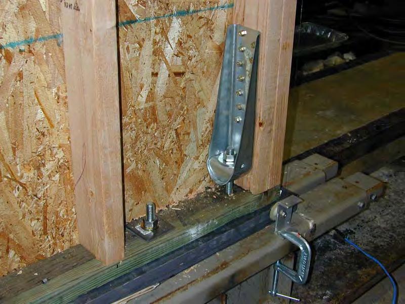 Shearwall assembly showing top loading beam