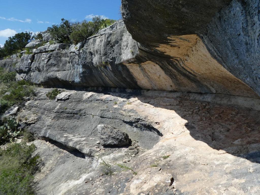 Site Name: Lost Canyon West Shelter Trinomial: 41CX1019 Site Type: Multicomponent site: Rockshelters with pictographs, groove marks, a spring, bedrock features and large lithic scatter on the mesa