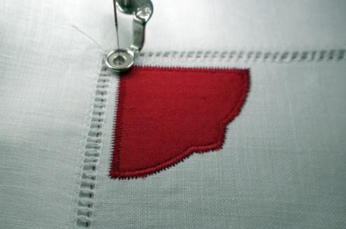 Embroider the Placemat Designs Hoop two pieces of OESD Ultra Clean & Tear together as one.