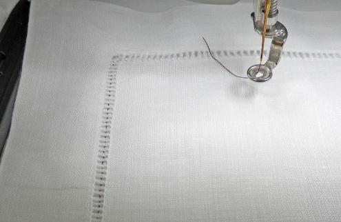 Repeat the steps above to embroider the lower right corner of the placemat.