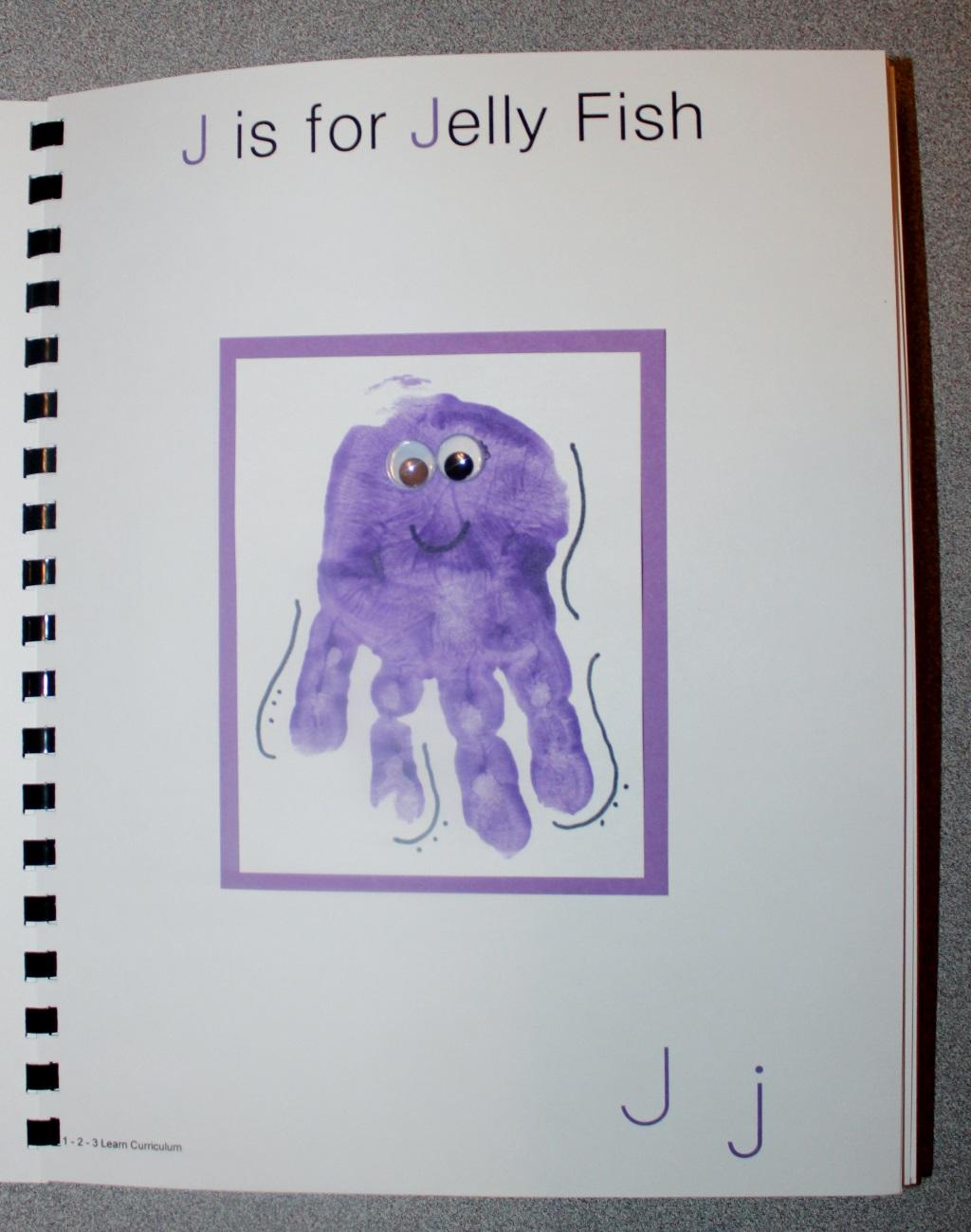 J is for Jelly Fish Paint the child s hand purple and place on white card stock. When dry draw a few lines around the fingers and dots.