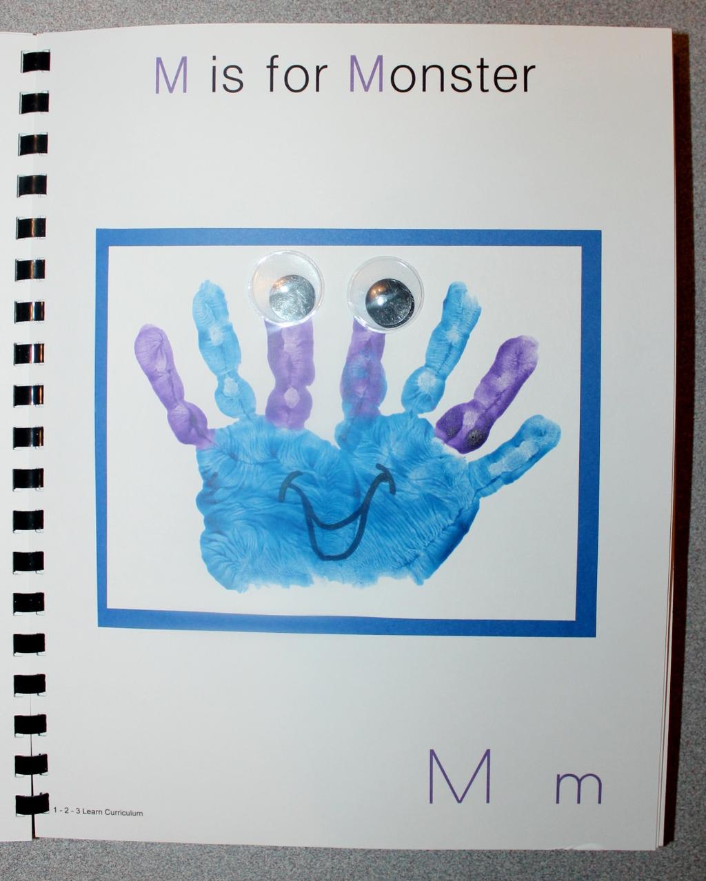 M is for Monster Paint the child s hand blue and alternate painting the fingers blue and purple. (You will not be painting the thumb).