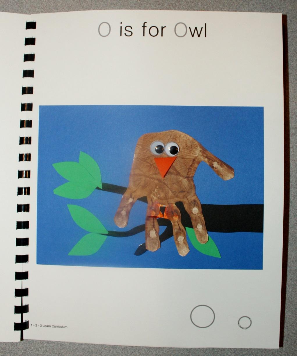 O is for Owl Ahead of time cut out a branch using black card stock and leaves using green card stock. Paint the child s hand brown and place on a piece of white card stock.