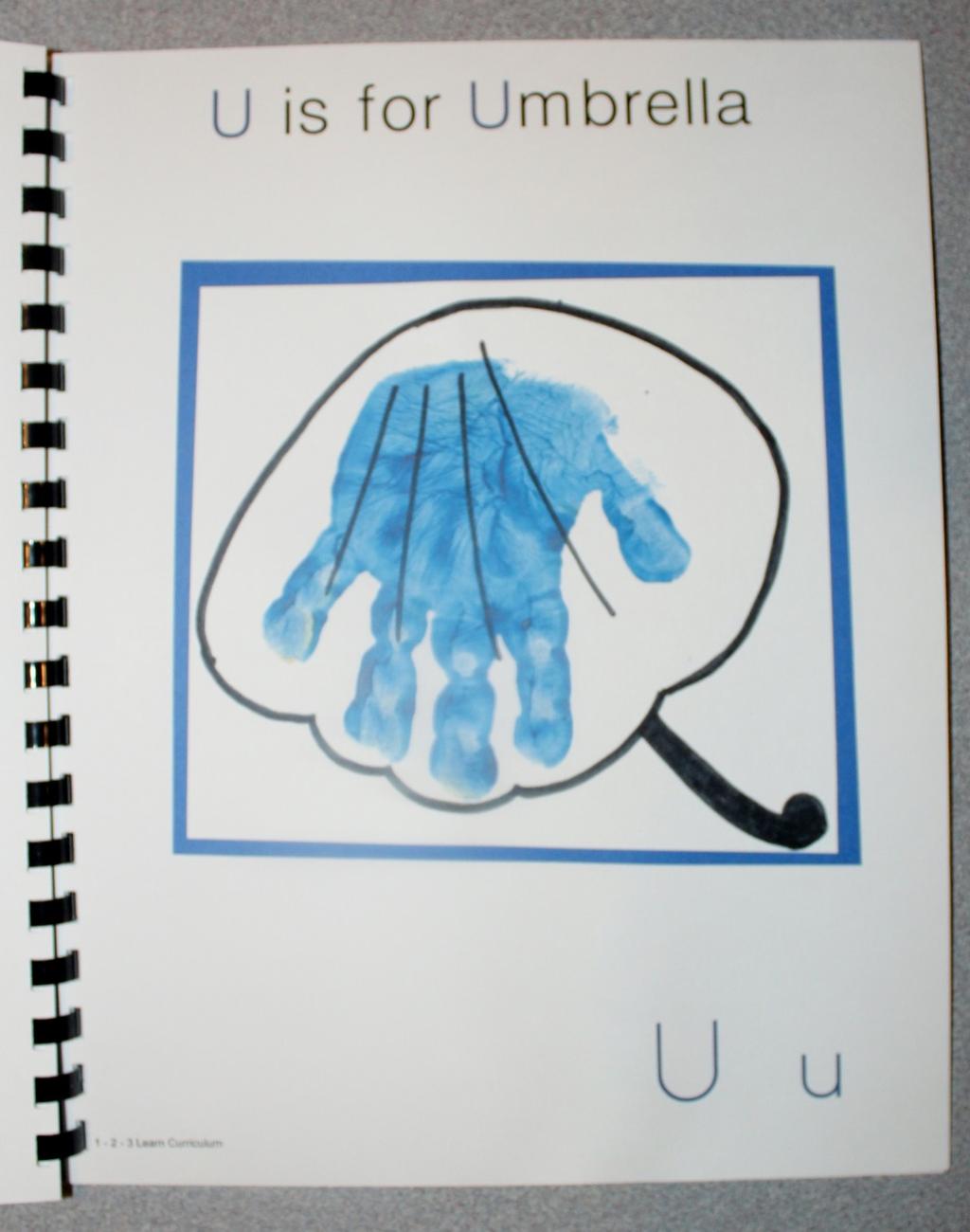 U is for Umbrella Paint the child s hand blue and place on white card stock. When dry, trim and attach to blue card stock.