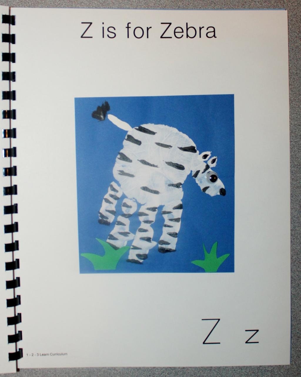 Z is for Zebra Paint the child s hand white and place on blue card stock. When dry, using white paint add a small tail and ears.