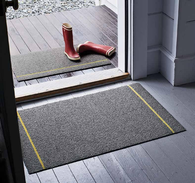 Made of coarse PVC yarns and positioned deliberately at the mat s edge, they can scrape away debris from shoes and boots.