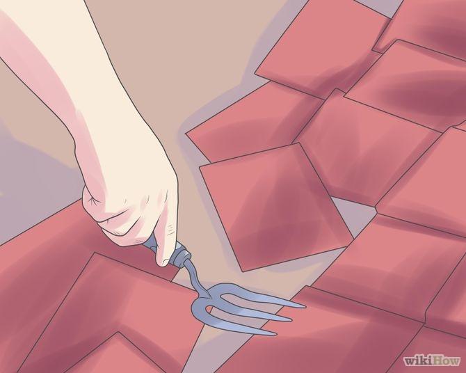 1 Remove old shingles and flashing. Start removing the shingles at the peak farthest from the trash container, or the corner you want to collect the shingles in.