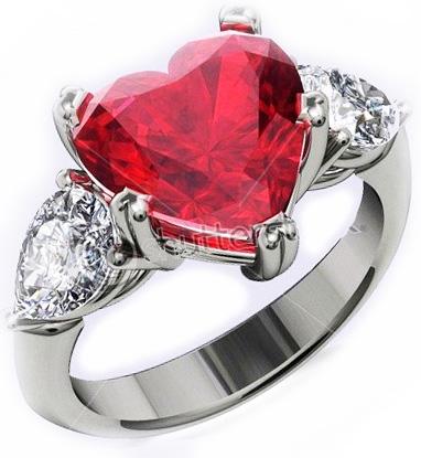 Ruby & Diamond Three Stone Ring: 18K white gold (stamped "18K") Cast & Assembled Ruby & Diamond Three Stone Ring, size 6.5, weighing 6.5 g. The workmanship is good to very good.