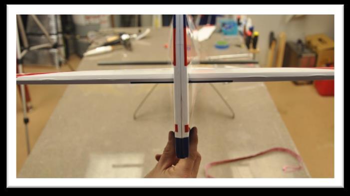 Measure the distance between the canopy latch and the corners of the horizontal stabilizer.