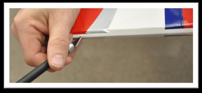Align the end of the rudder with the top of the vertical stabilizer. Push the rudder tight against the stabilizer closing the gap between the two of them.