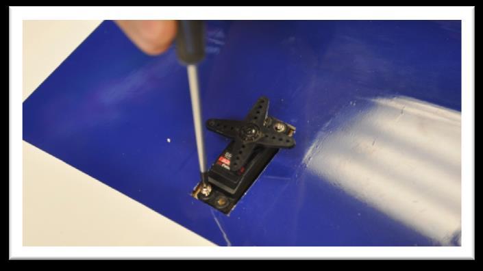 Apply a drop of thin CA glue into each mounting screw hole.