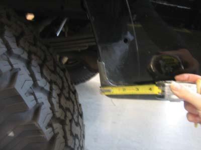 5 6 3rd Factory Hole At FRONT of wheel well, use a tape measure and a grease pencil to mark a