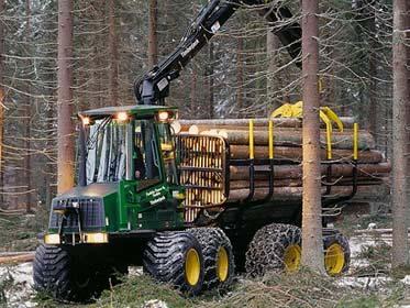 machine - cuts trees and debrach them