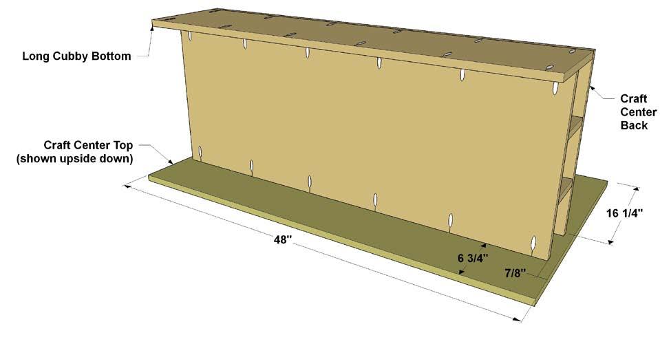 Step 19: Lay the Craft Center Top face down on a flat surface. Set the Long Cubby assembly on the Desktop as shown.