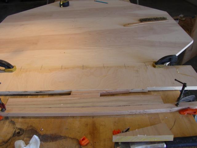 Remove all the clamps and the wedges and put the ring back on top of the plywood.