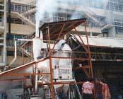 A prototype of an agricultural waste boiler at the University of Philippines, AAECP Phase II.