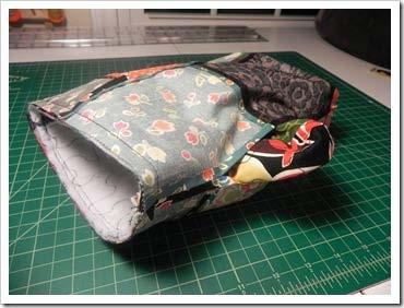 Put the quilted outer bag and the lining right sides together and pin the top raw edges together.