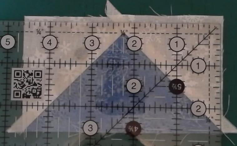 (7) Trim Flying Geese units to 2½ x 4½ My video tutorial has very helpful, detailed instructions if you need help with trimming to size.