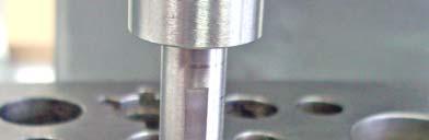 impeller setting tool over the spindle, (as pictured at left).