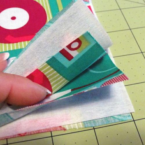 6. Adjust the stack so the edges of all six layers are flush on all sides.