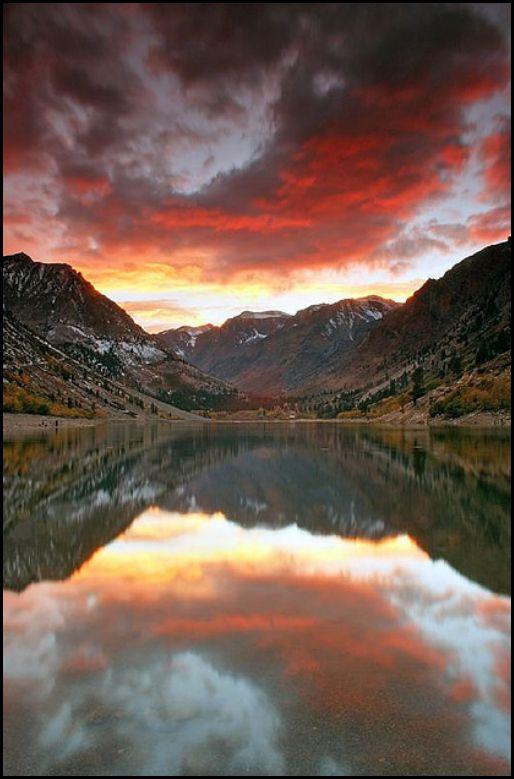 Jeff Sullivan used the fall colors as a design element in these two images. On the far left, an early-morning image of the reflections of the mountain and trees in North Lake.