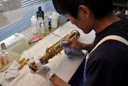 1. Cleaning Following final inspection, the protective tape is removed and the sax is