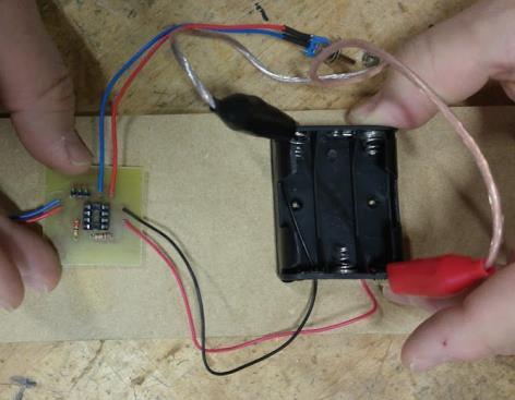 FIRST - test the board for short circuits by attaching it to a power supply WITHOUT