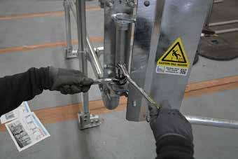 Mounting and tensioning gate spring L. Using the 15/16 socket & ring spanner start to tighten the bolt until the gate completely closes.
